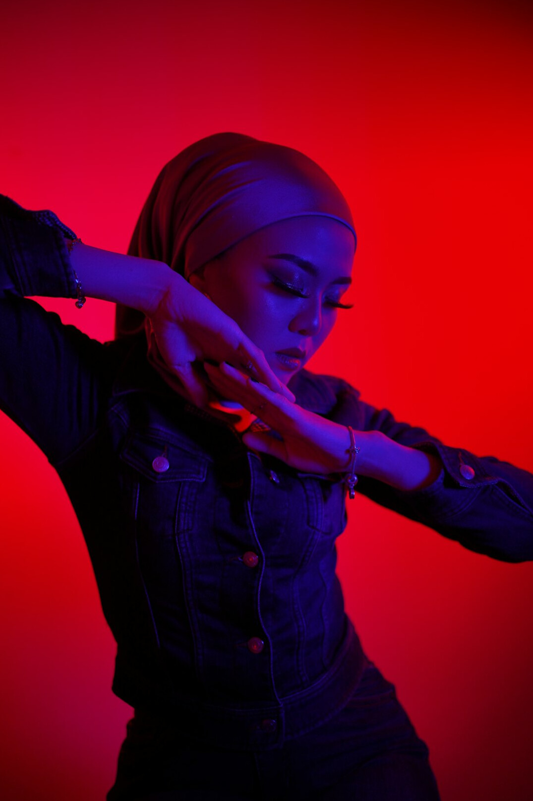 Studio portrait of a Malay-Singaporean woman event producer